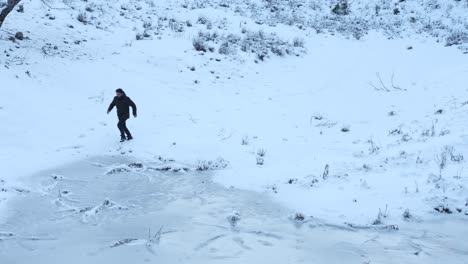 man jogging in snow