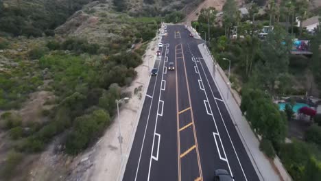 car driving up mountain roads aerial