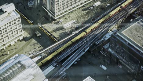 Aerial-view-of-trains-in-the-city-of-Berlin,-slow-motion