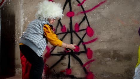 rebel grandma graffiti artist against an urban wall