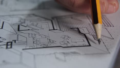 Reviewing-technical-drawing,-Architect-working-on-blueprint,-House-Construction-concept,-Macro-shot