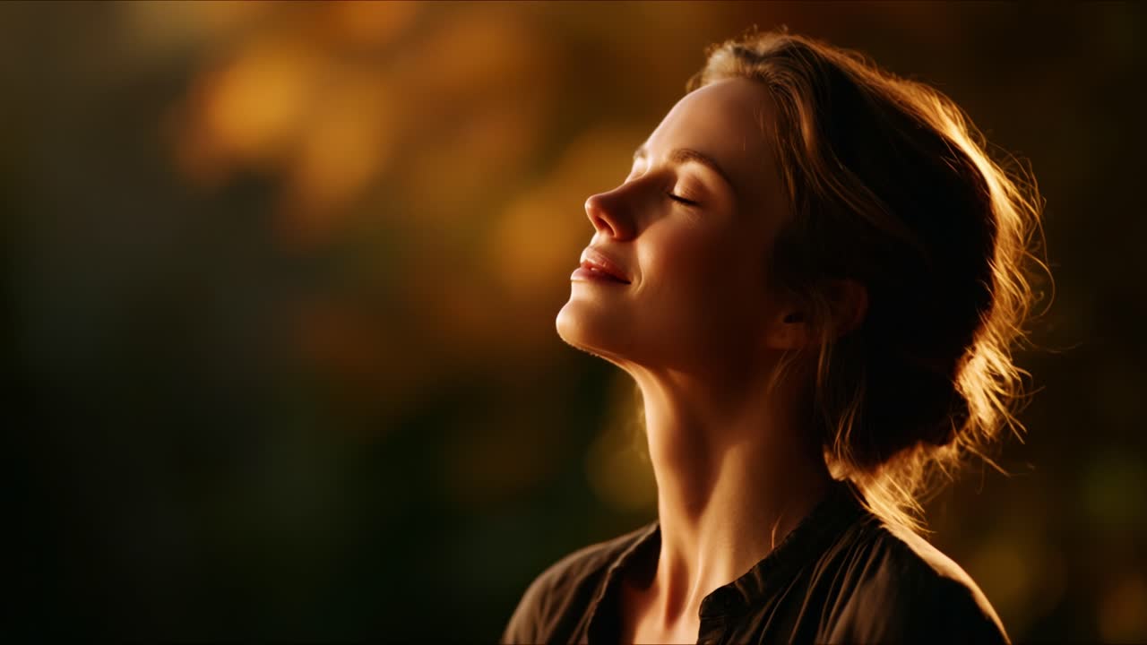 A woman experiencing a moment of serene joy, basking in the warm glow of soft sunlight while enjoying the beauty of nature, capturing pure happiness and tranquility in the golden hour