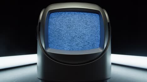 retro tv, vintage television in a nostalgic setup, a retro tv displays grain on screen, scary halloween night device good for chroma key and green screen. high quality 4k footage