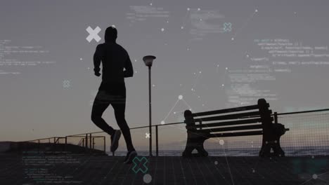 animation of connected dots and computer language over african american man running at beach