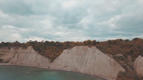 aerial clip of the scarborough bluffs rock cliffs during autumn, in lake ontario, canada