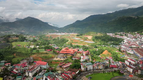 in sapa’s land where mountains soar, clouds embrace the hills they adore