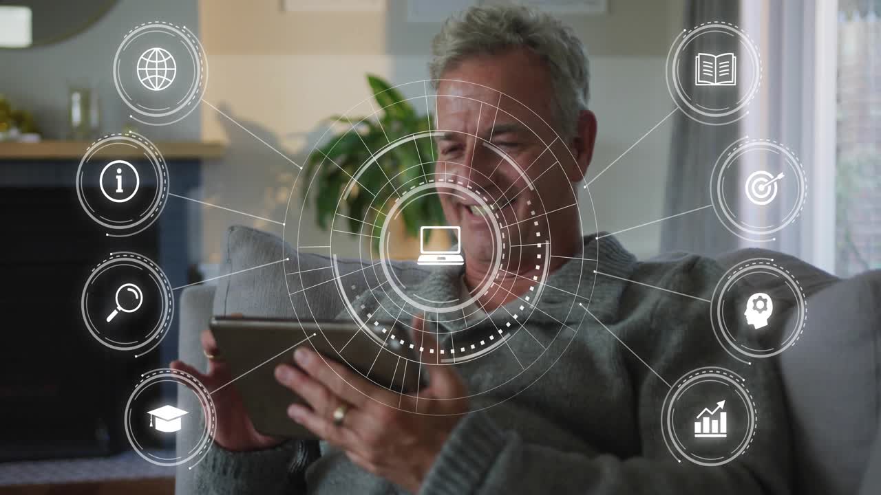 Senior man on sofa using tablet in tech demo, tapping, starting HUD rings growing, icons settling