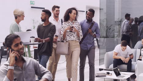4k video footage young colleagues walking through