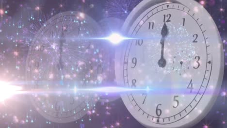Animation of new year&#039;s eve clock showing midnight and glowing lights