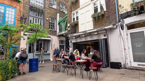 people dining and walking in covent garden