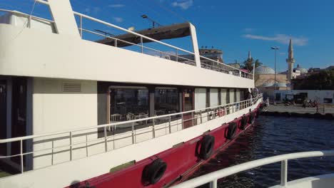 people getting off a boat in a city