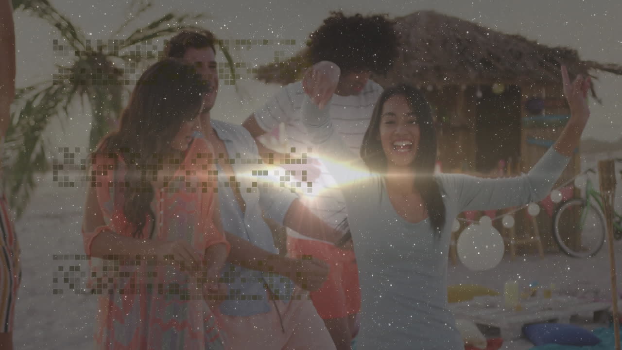 Group dancing around beach picnic table at sunset, showing lantern icons and marketing charts