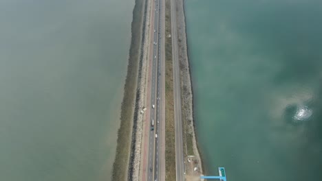 a breakwater road that separates the sea