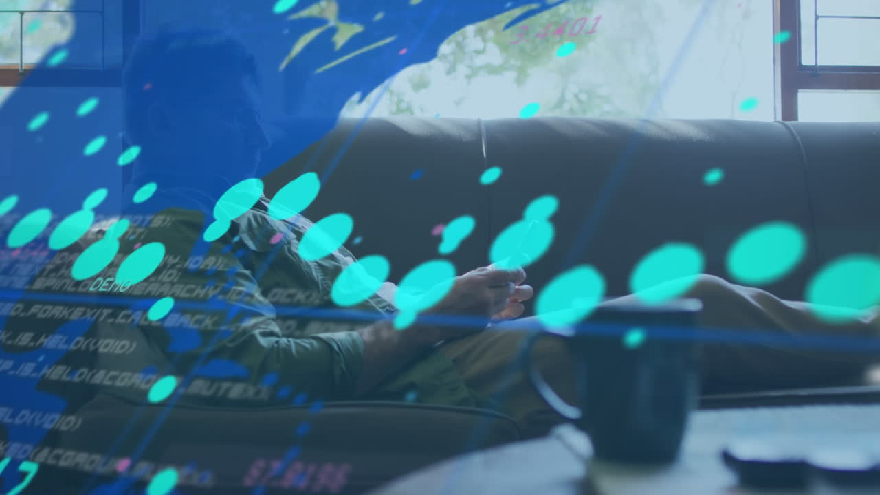 Animation of numbers and data processing with world map over caucasian businessman using smartphone