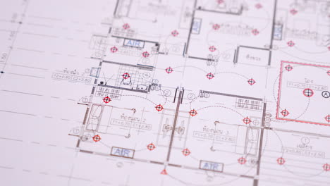 Architect's workspace with building plans and blueprints