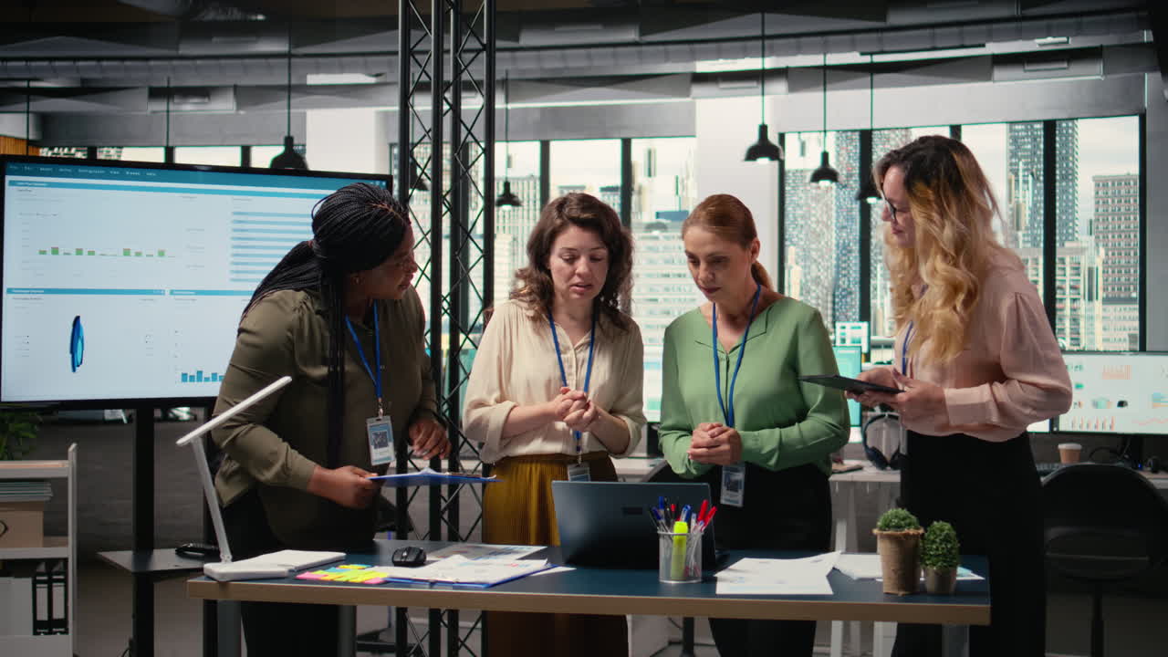 Vertical Video Diverse team of businesswomen review analytics and refine their vision