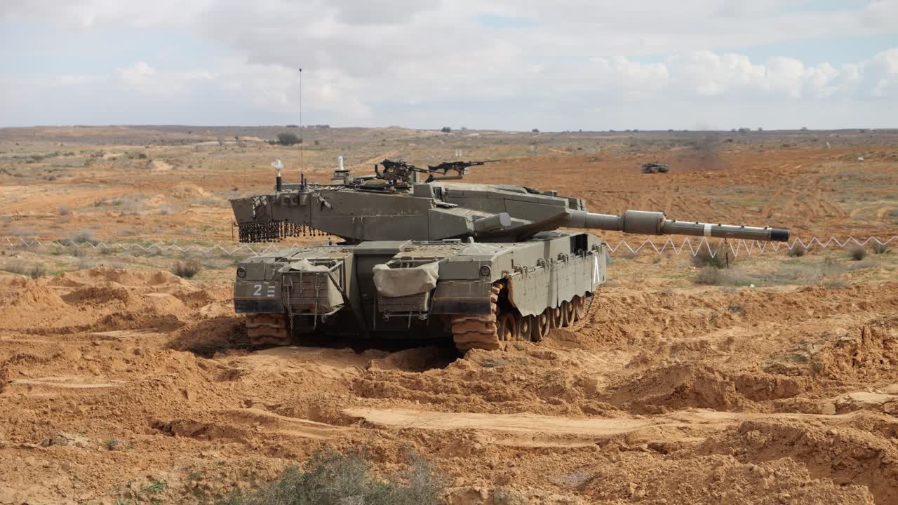 Drone View of military tank vehicles in a large military training field, IDF , Israel, Palestine
