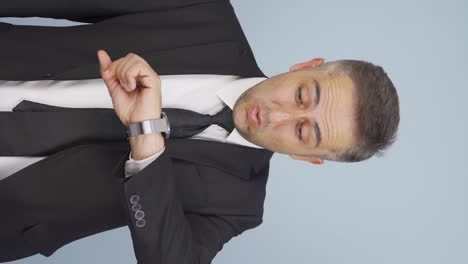 Vertical-video-of-Businessman-with-time-pressure.
