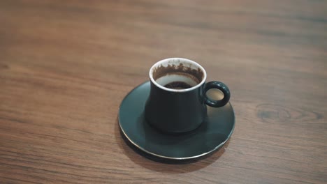 fresh coffee cup on a wooden table