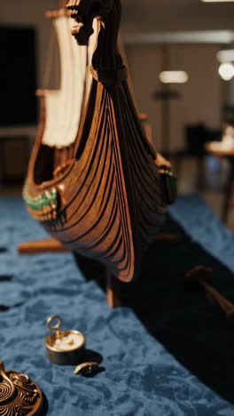 wooden viking longship model on display