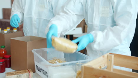 volunteers packing food donations