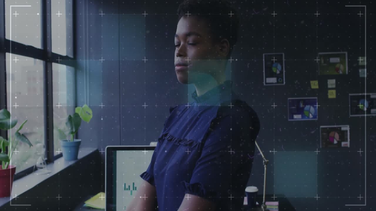 Animation of data processing over african american businesswoman in office