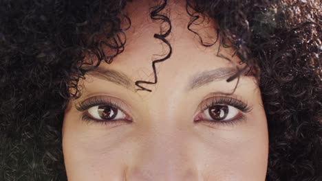 Portrait-of-happy-african-american-woman-looking-at-camera,-slow-motion