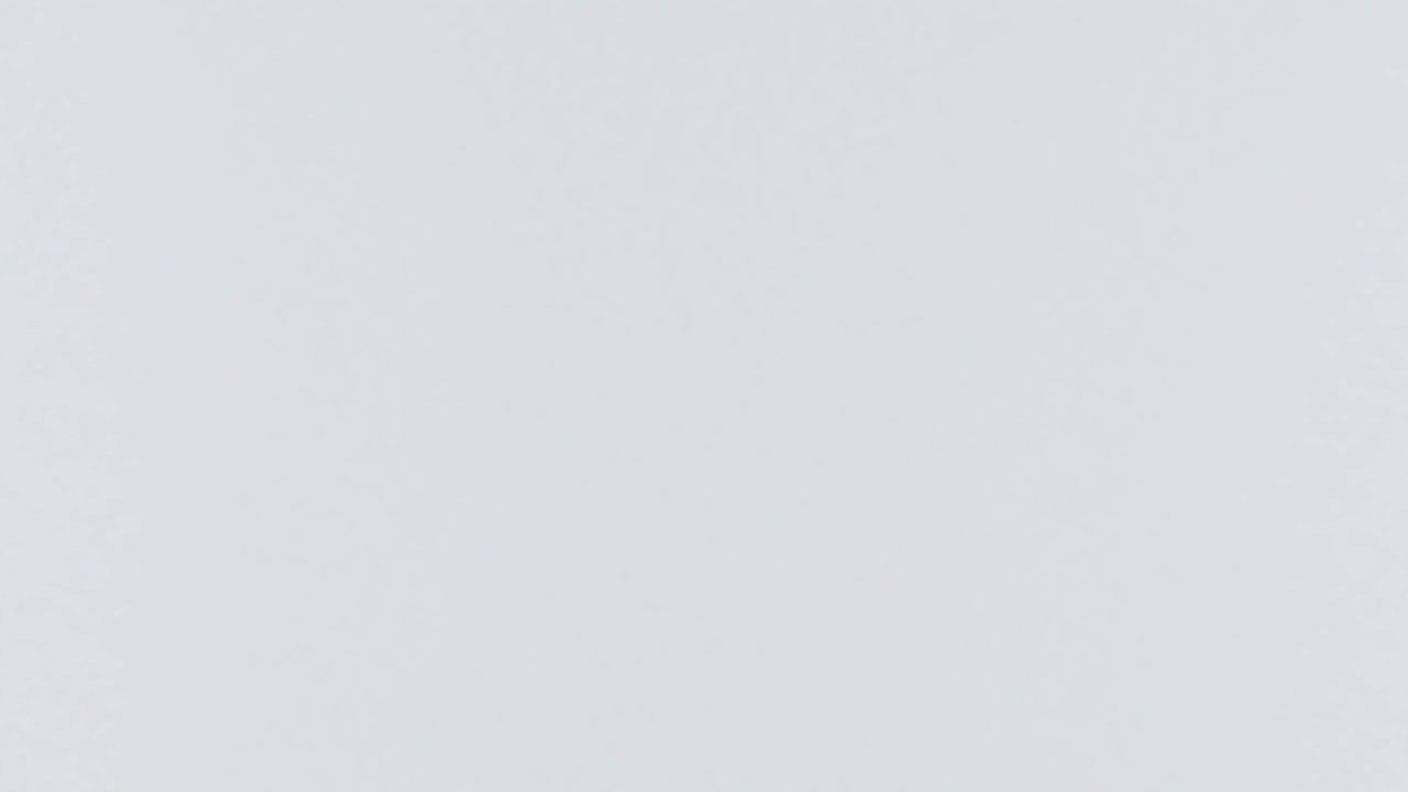 Ramadan Kareem greeting with mosque and hand drawn calligraphy lettering on night cityscape background.