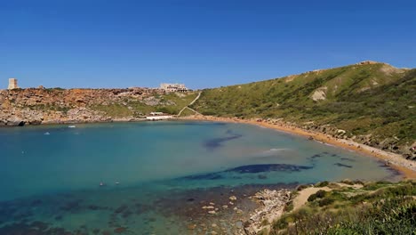 Timelapse-video-from-Malta,-Mgarr,-Ghajn-Tuffieha,-people-are-going-out-to-enjoy-the-sunny-day