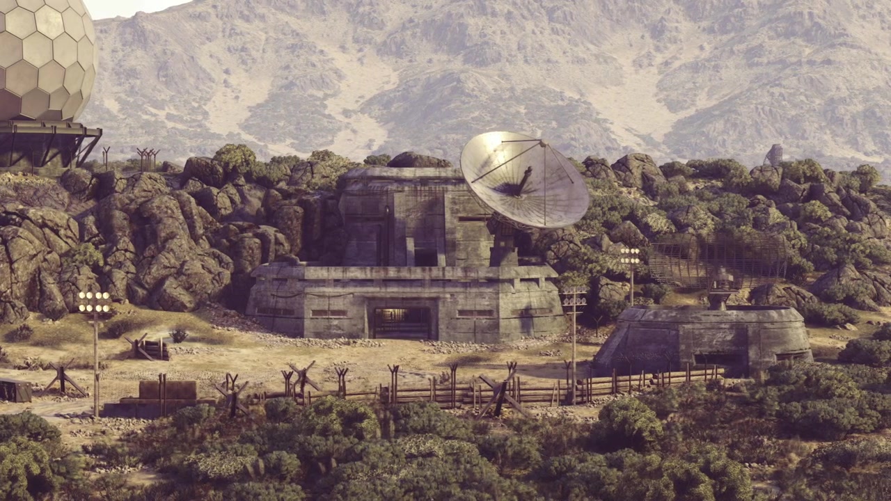Overgrown relic of cold war communications on rugged mountain landscape