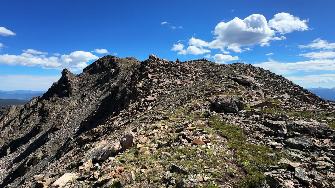 Notch Mountain Shelter Falls Creek Halo Ridge spring spring summer blue sky clouds Colorado Mount of the Holy Cross 14er hiking walking Half Moon Pass Rocky Mountains pan left motion