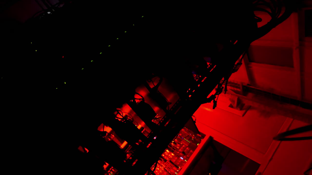 Close up of a server with flashing red lights in a data center