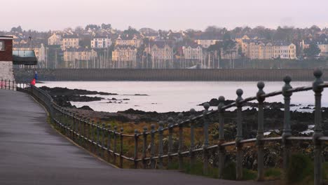 fog-over-seaside-town-and-sea