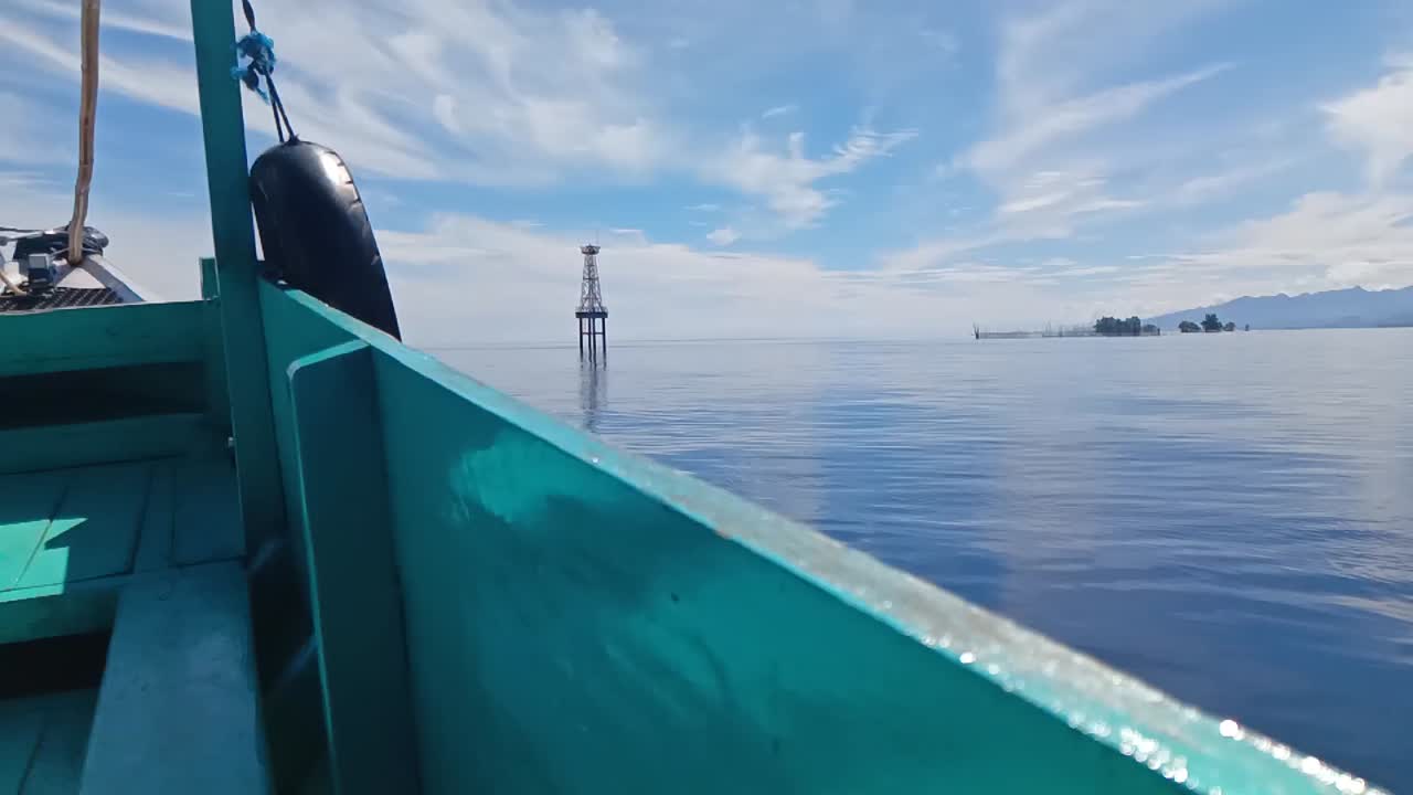Boat sailing on Karampuang island sea_slow motion shot
