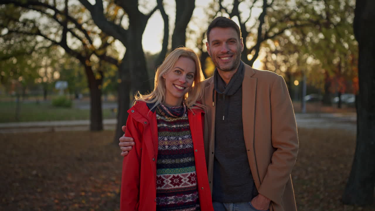 Couple in a park during autumn