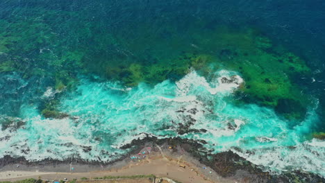 wander along the wild and windswept coastline of tenerife island in spain