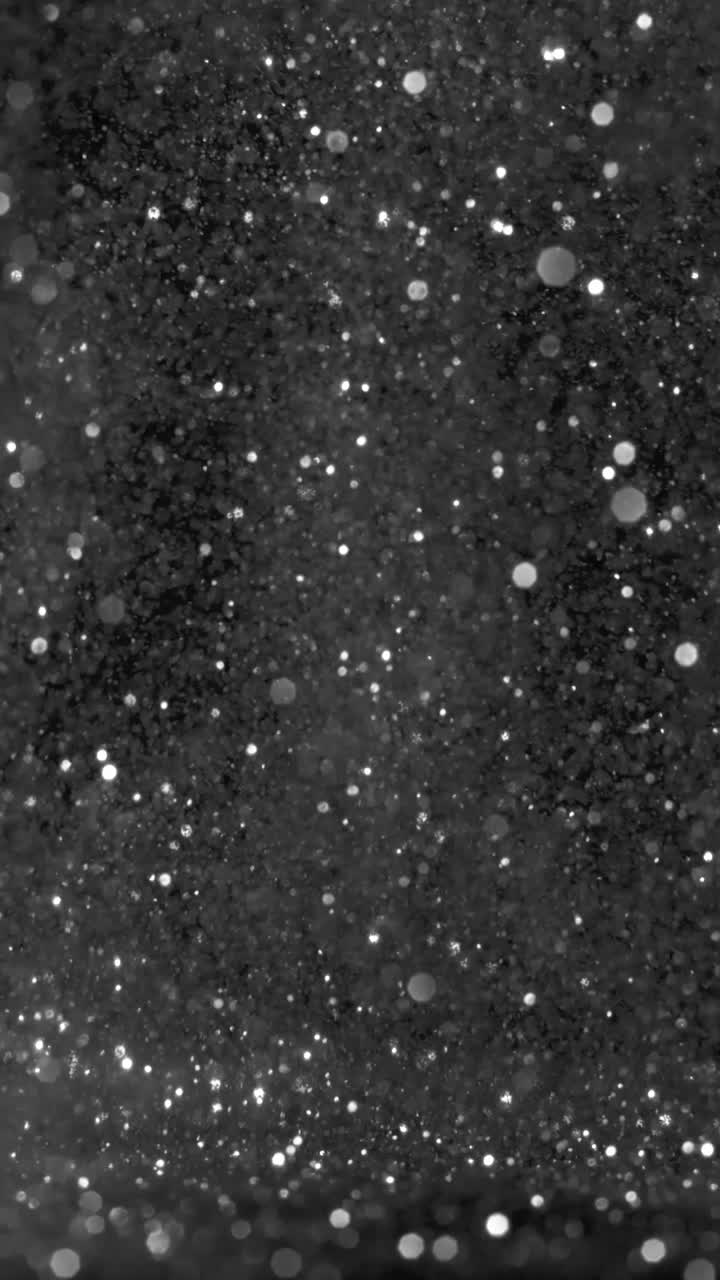 Falling Glitter Particles Background Vertical View