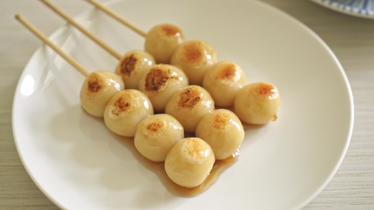 Mitarashi dango. Dumpling in a sweet soy sauce - Japanese traditional style