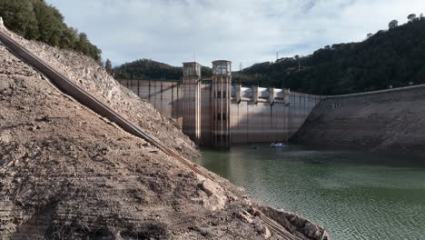 aerial view approaching sau reservoir with low ter river water supply, catalonia