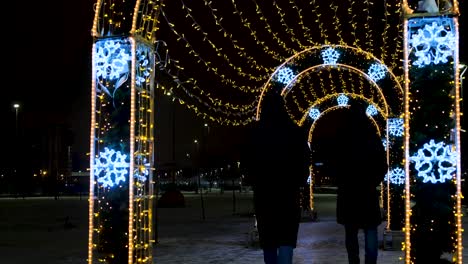 winter holiday archway at night