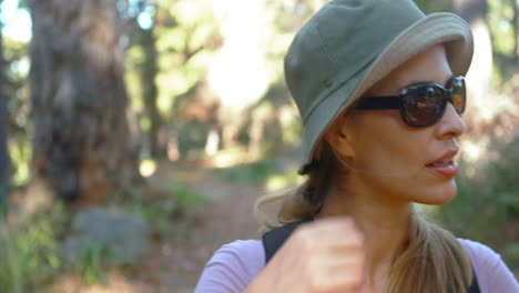 tired hiker walking with backpack