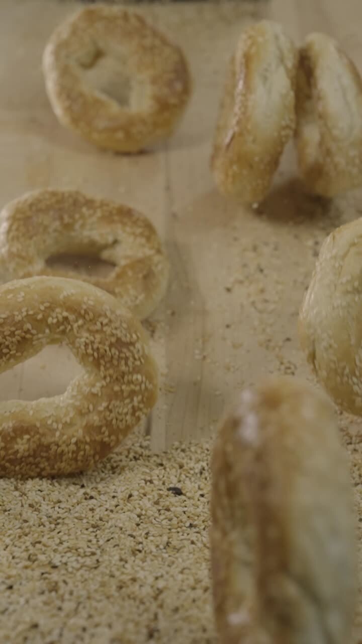 Dough nutty bagel rolling on a cutting board