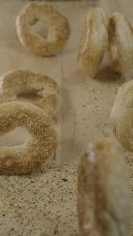 dough nutty bagel rolling on a cutting board