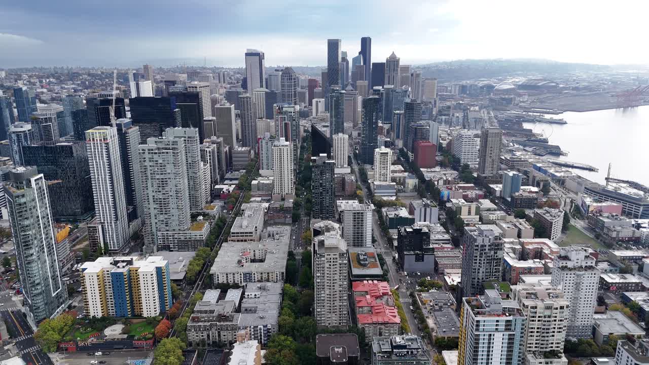 cinematic aerial Seattle downtown skyline, modern city architecture building Washington State largest city on the pacific ocean