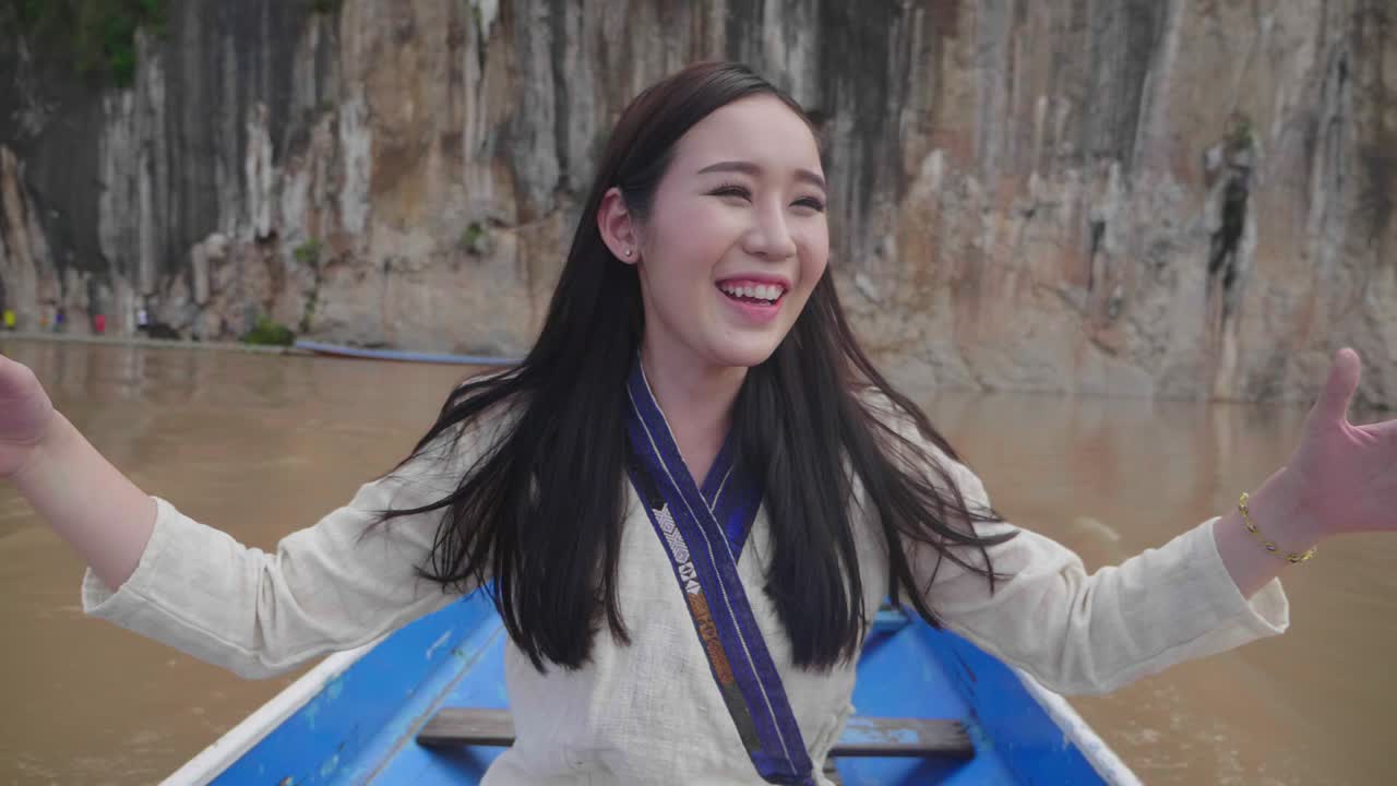 Woman enjoying a river trip