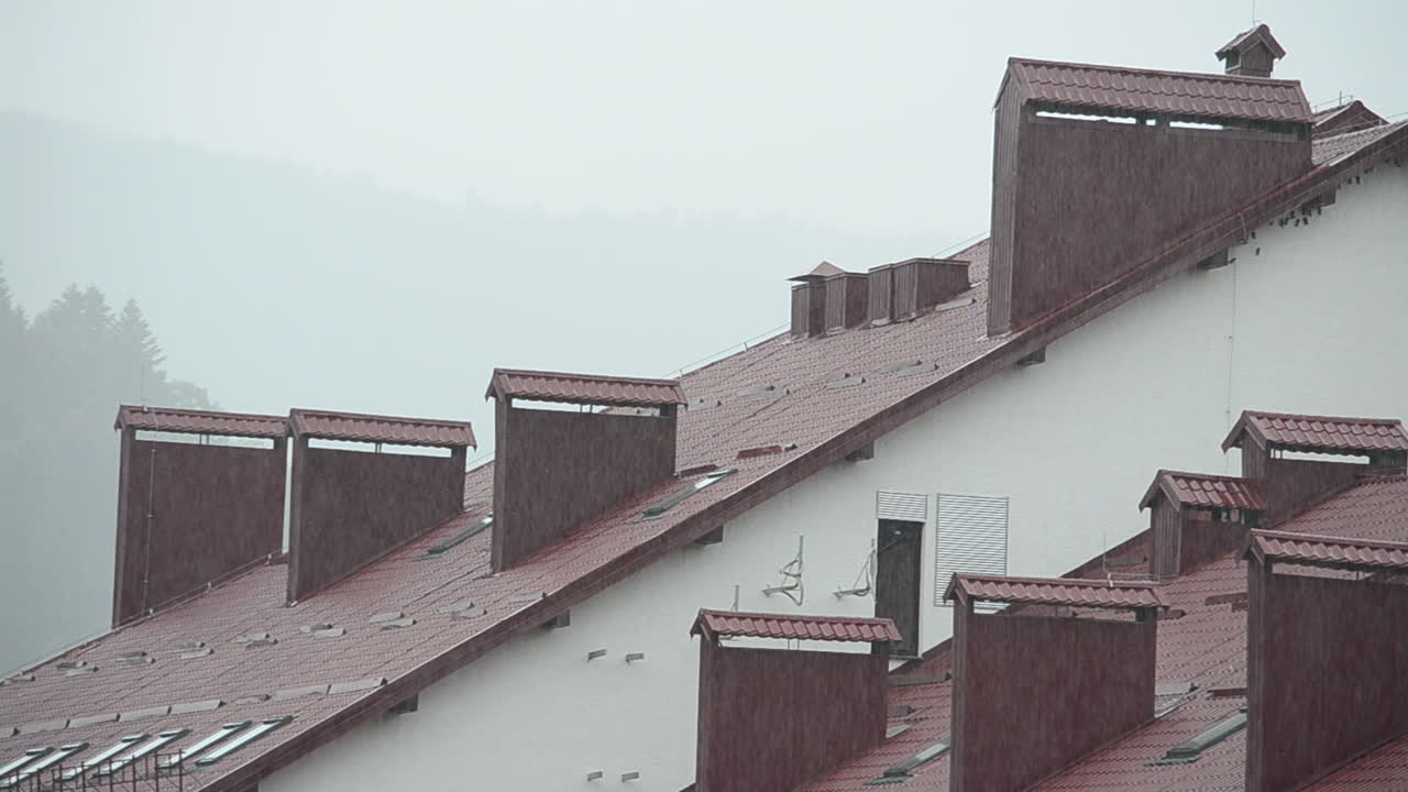 Hotel in mountains, a rain. Weather in the summer