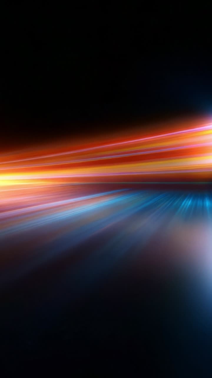 Vibrant Motion Blur: A Dynamic Display of Colorful Light Streaks in an Abstract Dark Setting Capturing Energy, Speed, and Artistic Expression