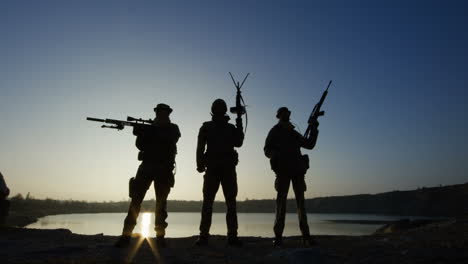 silhouette of soldiers at sunset