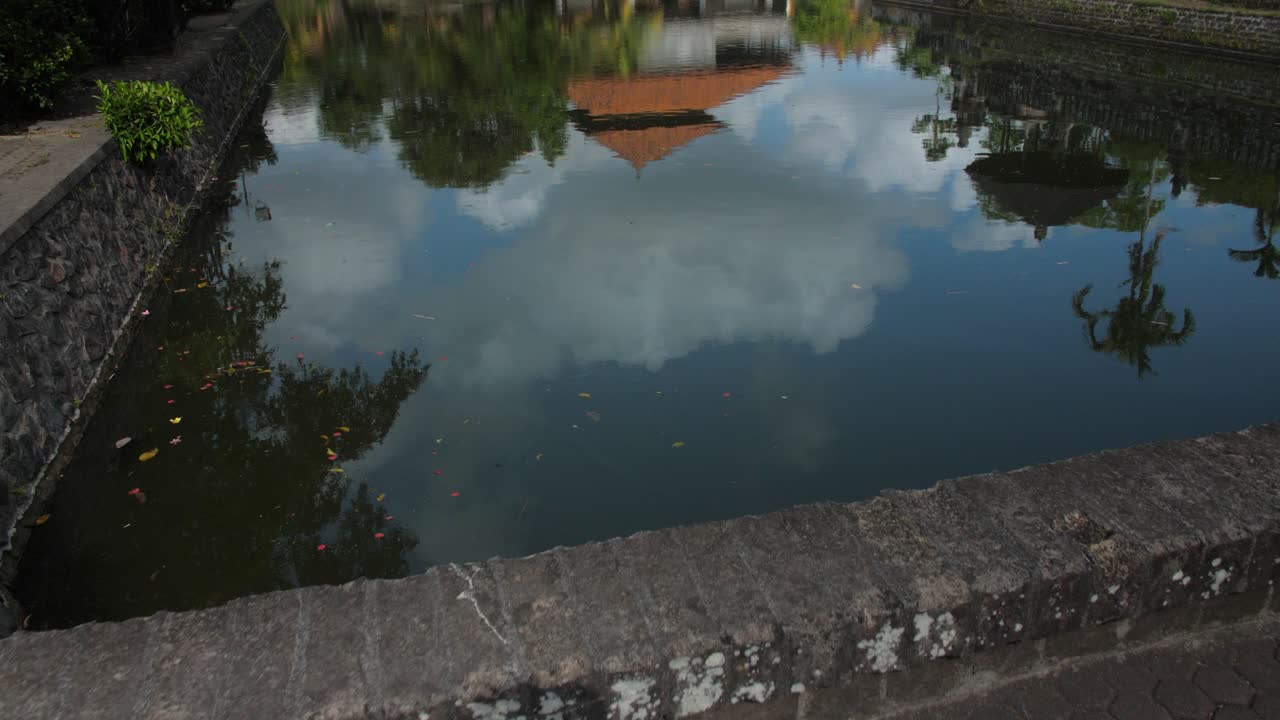 Pura Taman Ayun temple garden entrance with water canals, Badung Regency, Bali, Indonesia.