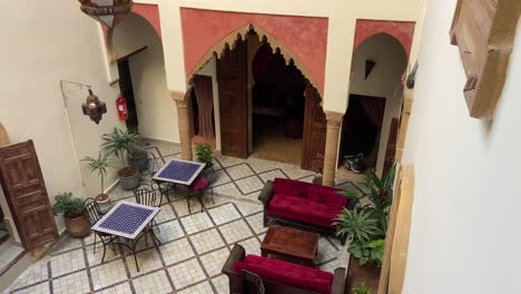 courtyard of traditional moroccan riad in the morning sunlight